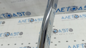 Left Mazda CX-5 22-25 chrome grille molding, broken mount, scratches