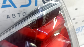 Left headlight for a 2015-2017 Toyota Prius V, scratches