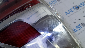 Left headlight for a 2015-2017 Toyota Prius V, scratches