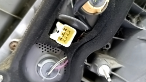 Left headlight for a 2015-2017 Toyota Prius V, scratches