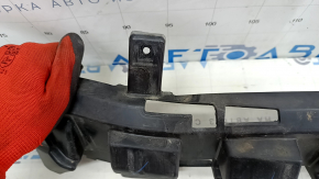 The front bumper absorber of the Jeep Compass 22-25 is dented.