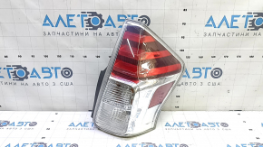 Right headlight for a 2015-2017 Toyota Prius V, broken cover, scratches