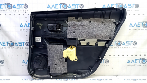 Rear left door panel for Toyota Prius V 15-17, black, black leather insert, with handle, scratches