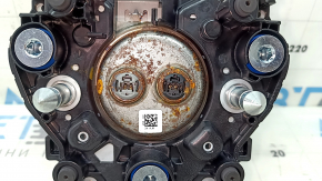 The Honda CRV 23-25 driver's steering wheel airbag is black and has a rusty squib.