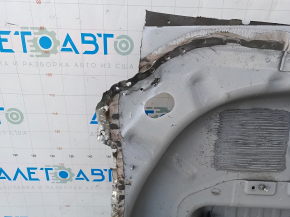 The trunk trough of the Ford Escape MK4 20-25 hybrid has been drilled out.