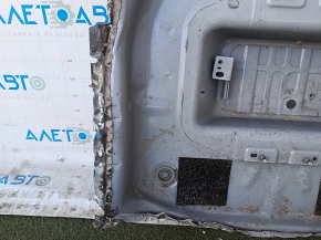 The trunk trough of the Ford Escape MK4 20-25 hybrid has been drilled out.