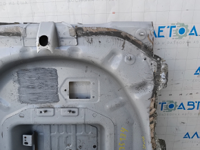 The trunk trough of the Ford Escape MK4 20-25 hybrid has been drilled out.