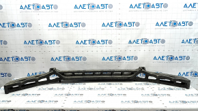 The front bumper absorber of the Mercedes W167 GLE 350 450 20-23 is broken, dented, missing a fragment