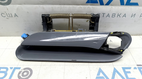 The outer front left door handle of a Volkswagen ID.4 21-22 keyless entry system is cracked and missing a component. The latch is broken.
