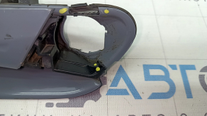 The outer front left door handle of a Volkswagen ID.4 21-22 keyless entry system is cracked and missing a component. The latch is broken.