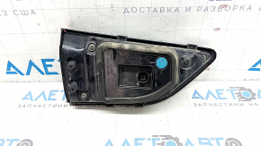 The right inner taillight of the Ford Escape MK4 2023-2024 has cracks, glue, and scratches.