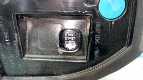 The right inner taillight of the Ford Escape MK4 2023-2024 has cracks, glue, and scratches.