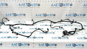 The wiring harness for the front bumper of a Ford Escape MK4 23-25 for parking sensors, a camera, an ambient air temperature sensor, a central light, and fog lights is broken.