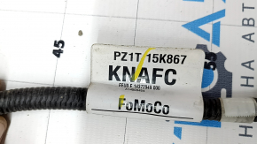 The wiring harness for the front bumper of a Ford Escape MK4 23-25 for parking sensors, a camera, an ambient air temperature sensor, a central light, and fog lights is broken.