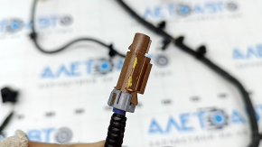 The wiring harness for the front bumper of a Ford Escape MK4 23-25 for parking sensors, a camera, an ambient air temperature sensor, a central light, and fog lights is broken.