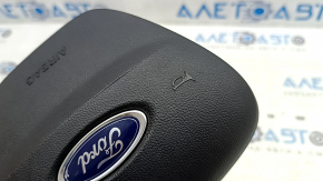 Black, scratched steering wheel airbag for the Ford Escape MK4 20-25 driver's side