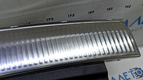 Audi Q7 16-25 trunk opening trim, black with chrome, scratches