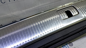 Audi Q7 16-25 trunk opening trim, black with chrome, scratches