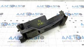 The right hood seal on an Audi Q7 16-25 is torn.