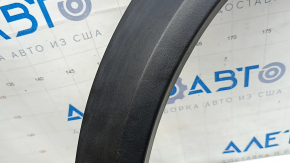 Front left fender arch trim for Nissan Rogue 21-24 US built, structure, scratches, crack in fastener, broken fasteners, in trash