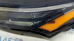 Left Nissan Rogue 21-24 halogen + LED turn signal, US-built, scratched