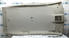Headlining for a 2021-22 Nissan Rogue without a sunroof, gray, with a rear ceiling light, needs cleaning, creases