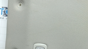 Headlining for a 2021-22 Nissan Rogue without a sunroof, gray, with a rear ceiling light, needs cleaning, creases