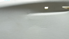 Headlining for a 2021-22 Nissan Rogue without a sunroof, gray, with a rear ceiling light, needs cleaning, creases