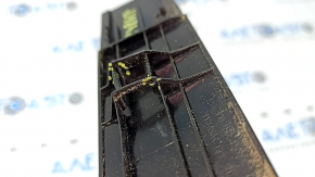The rear left roof lining of a 2021 Nissan Rogue has a broken mount.