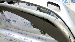 Bare front bumper for Toyota Prius 50 19-22 with parking sensors and PMA, silver, cracked, broken fasteners, scratches