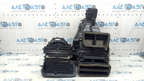 The bare heater housing of the Jeep Compass 22-25 under the manual