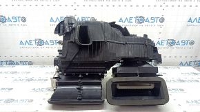 The bare heater housing of the Jeep Compass 22-25 under the manual