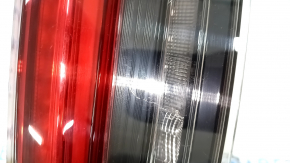 The inner tailgate light, left, BMW 3 G20 19-21, is worn, and has a bump.
