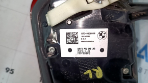 The inner tailgate light, left, BMW 3 G20 19-21, is worn, and has a bump.