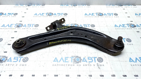 The lower front right control arm of a Nissan Rogue Sport 17-22 under R19 has a torn silent block.