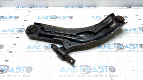 The lower front right control arm of a Nissan Rogue Sport 17-22 under R19 has a torn silent block.