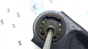 The lower front right control arm of a Nissan Rogue Sport 17-22 under R19 has a torn silent block.