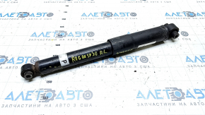 The rear left shock absorber of the Nissan Rogue Sport 17-22 is dented.