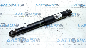 The rear right shock absorber of the Nissan Rogue Sport 17-22 is dented.