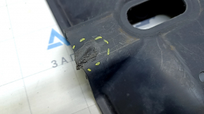 The left underbody protection of the Nissan Rogue Sport 17-22 is torn.