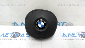 Airbag in the driver's steering wheel of a BMW 3 G20 19-24, black leather, M Sport, rusty squib, bumper