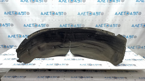 The rear right fender liner of a BMW X5 F15 14-18 is torn along the seam.