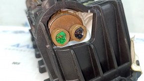 The passenger airbag in the dashboard of a BMW 3 G20 19-23 has a rusty squib.
