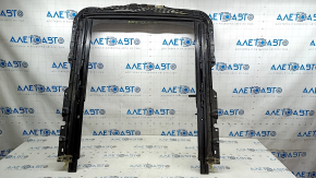 The sunroof mechanism on a BMW 3 G20 19-24 has a broken mount and is covered in soot.