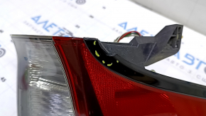 The upper left wing light of a Toyota Prius 50 19-22 is missing a chip, it's chipped