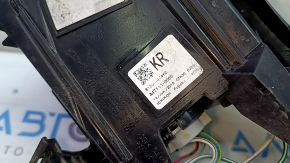 The upper right wing light of a Toyota Prius 50 19-22 is missing a chip and has scratches.