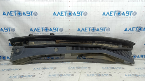 The plastic windshield wiper grille on a Lexus NX200t NX300 NX300h 15-21 is broken.