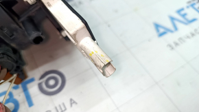 The charging port assembly with cable for the BMW X5 F15 16-18 plug-in has a broken connector.