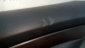 Front left door panel for Nissan Rogue 14-16, black with black plastic insert, leather armrest, gray molding, dented, scratches, worn
