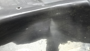 The right rear bumper guard for a Honda Clarity 18-21 USA is dented.